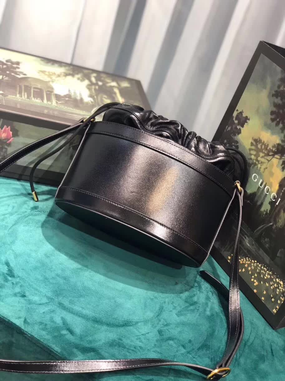 Alexander McQueen The Curve bucket bag black leather