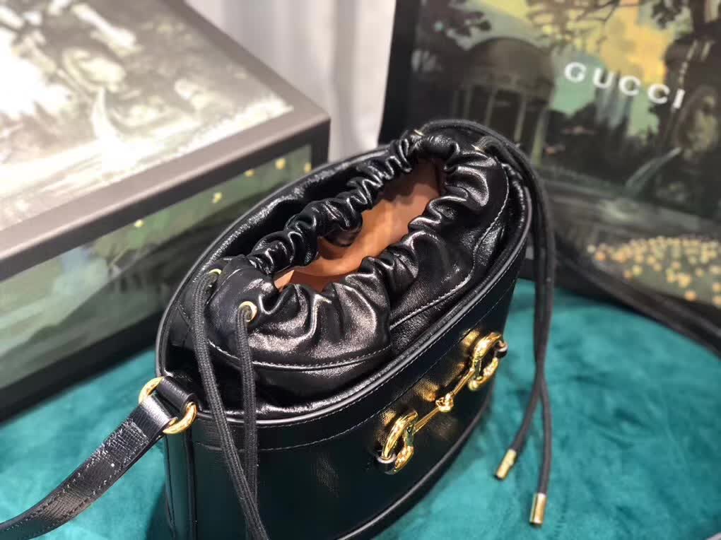 Alexander McQueen The Curve bucket bag black leather