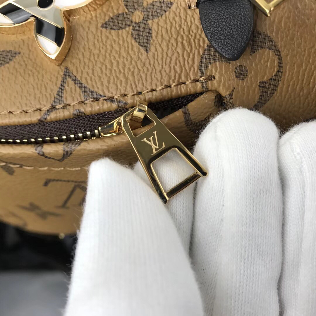 LV Palm Springs Mini Backpack in Monogram Reverse canvas