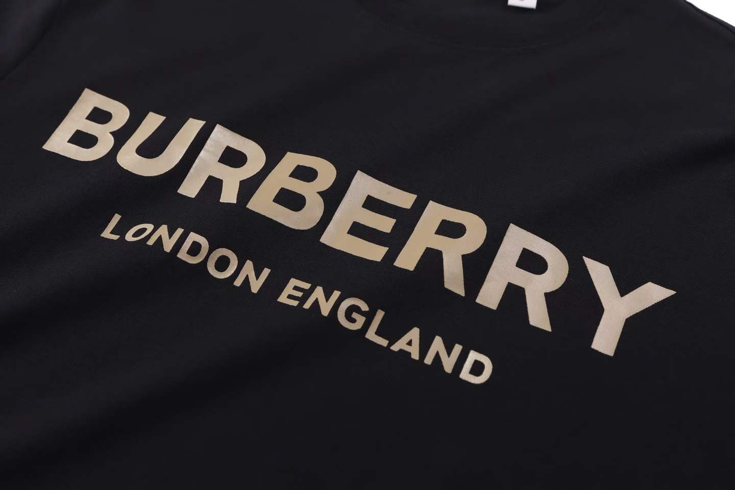 Burberry Black Letchford Logo T-Shirt, a cotton crew-neck top featuring the brand's logo printed on the chest