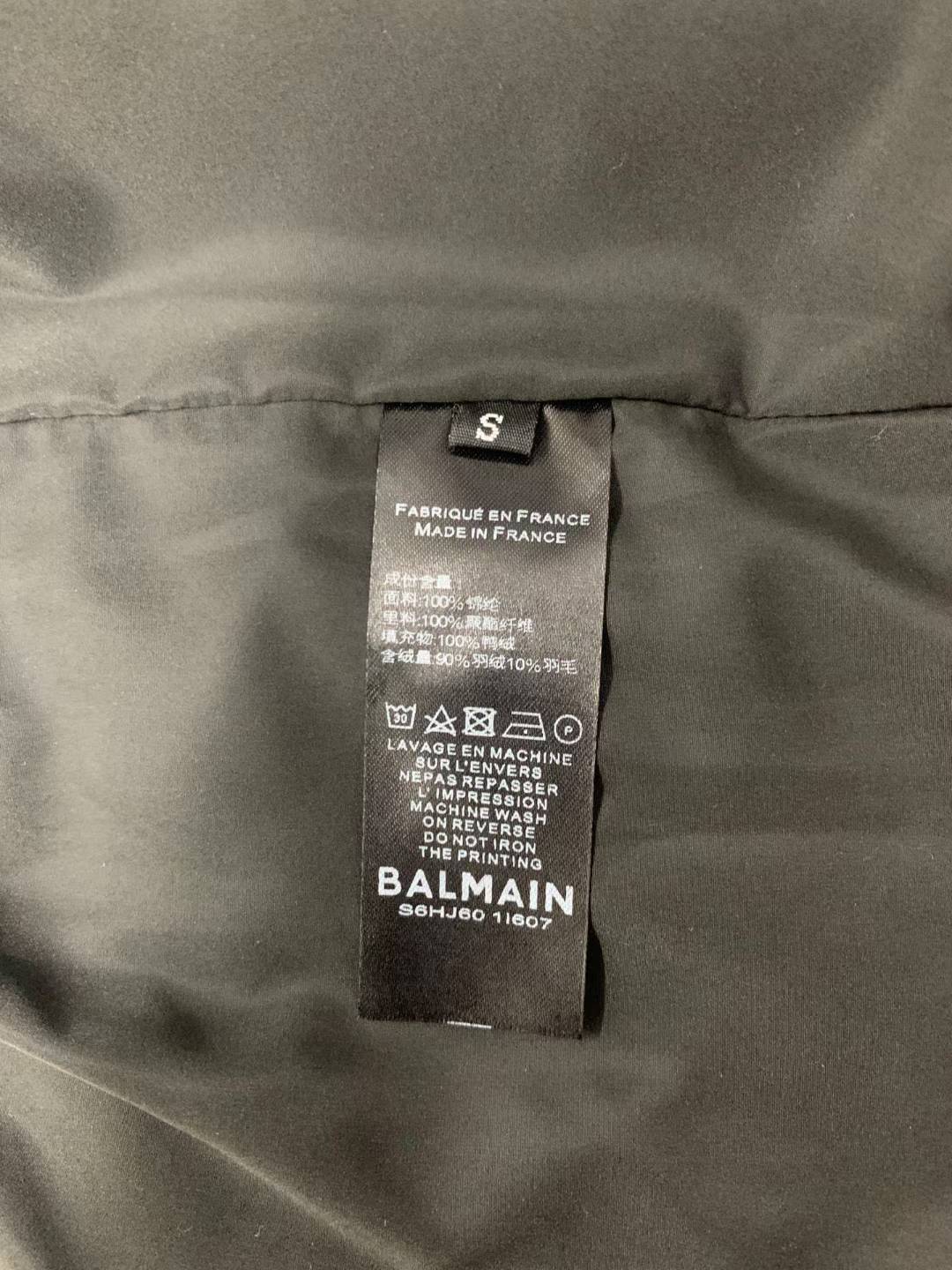 Balmain Maxi Monogram Quilted Jacket, a versatile luxury piece featuring detachable sleeves that allow it to be worn as a vest.