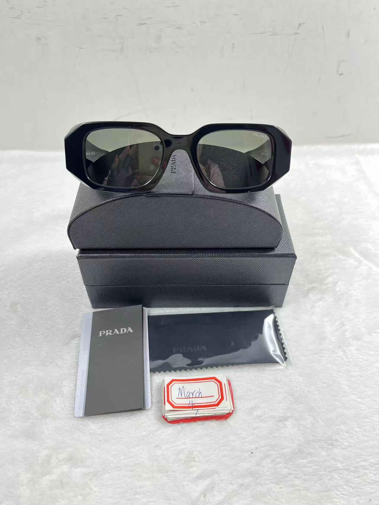 Prada Eyewear logo-lettering Rectangular Sunglasses Black