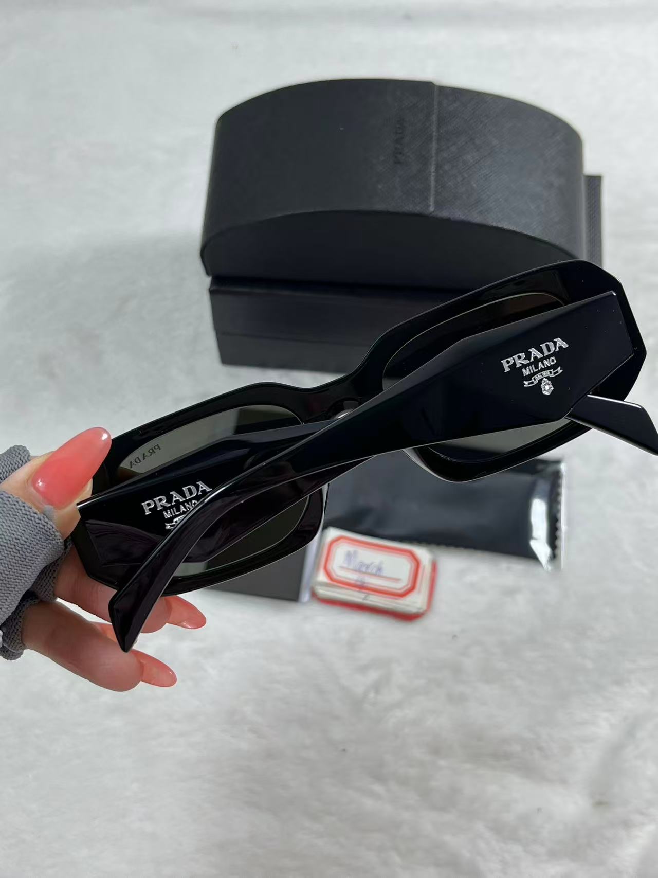 Prada Eyewear logo-lettering Rectangular Sunglasses Black