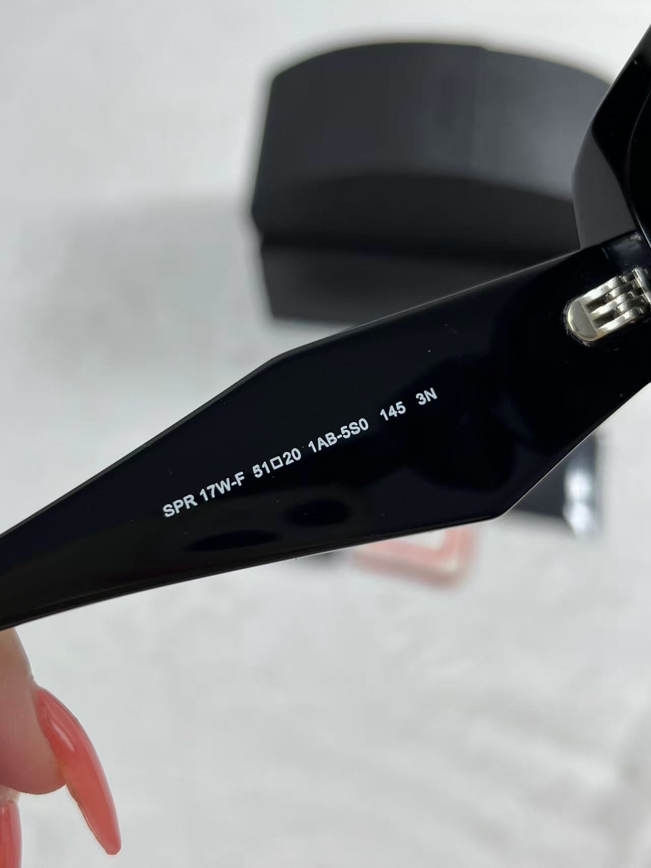 Prada Eyewear logo-lettering Rectangular Sunglasses Black