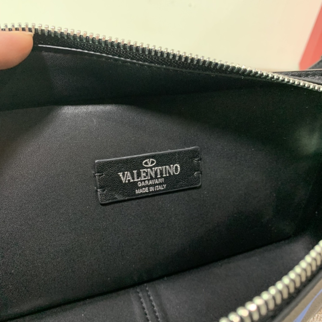 Valentino Garavani VLTN belt bag in black calfskin leather with a blue logo