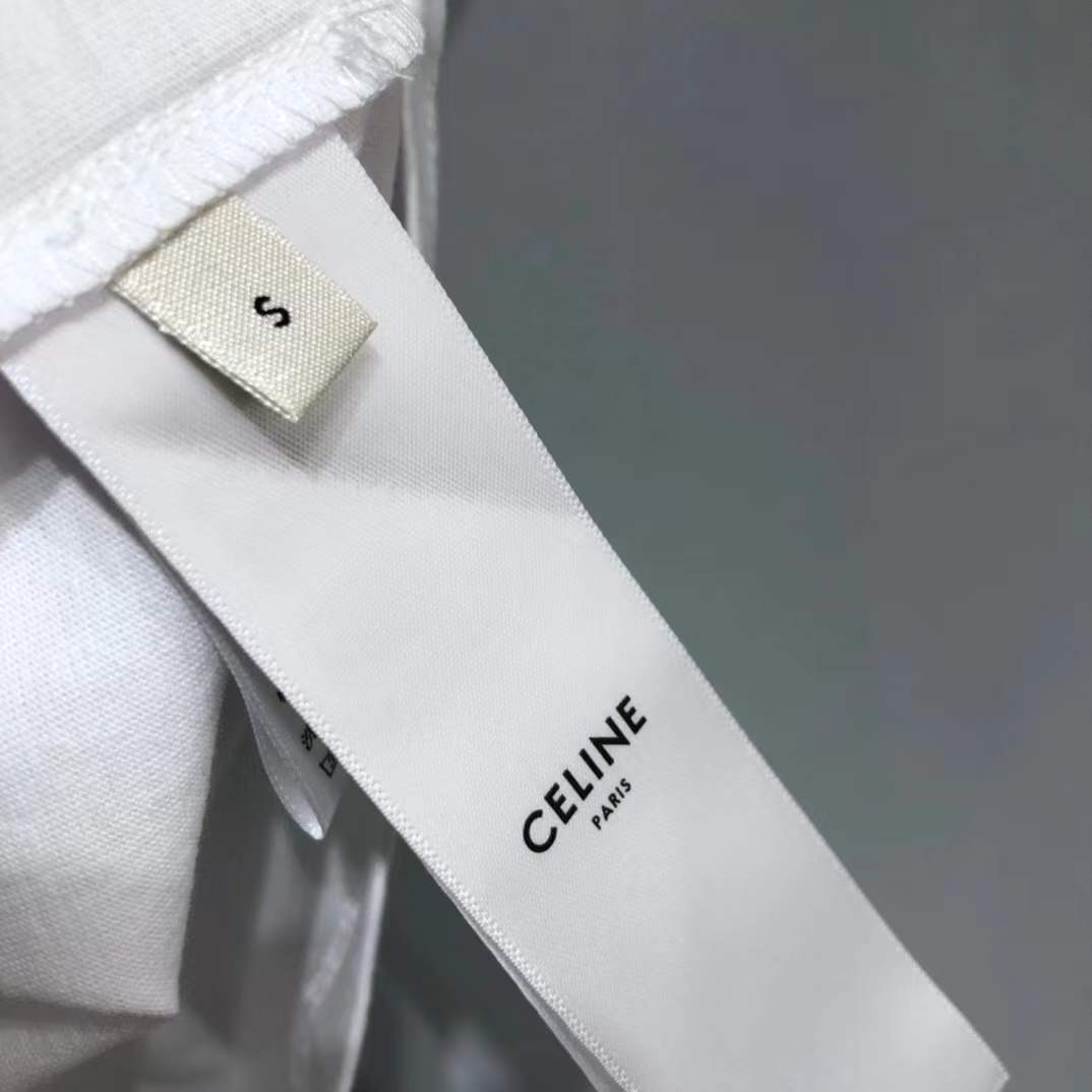 Celine T-shirt is crafted from cotton jersey and features a multicoloured logo print on the chest