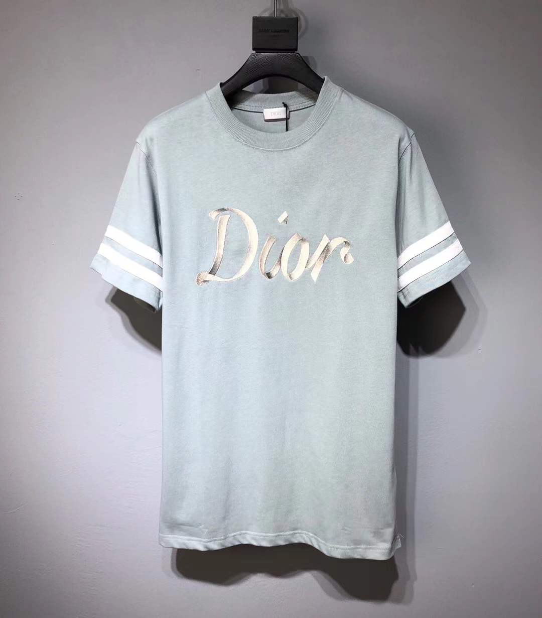 Dior Homme logo light green t-shirt from the Autumn/Winter 2022 collection.