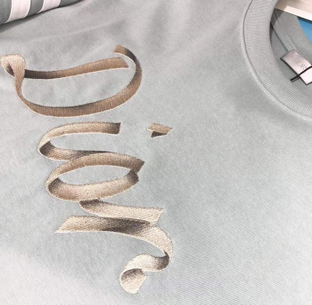 Dior Homme logo light green t-shirt from the Autumn/Winter 2022 collection.