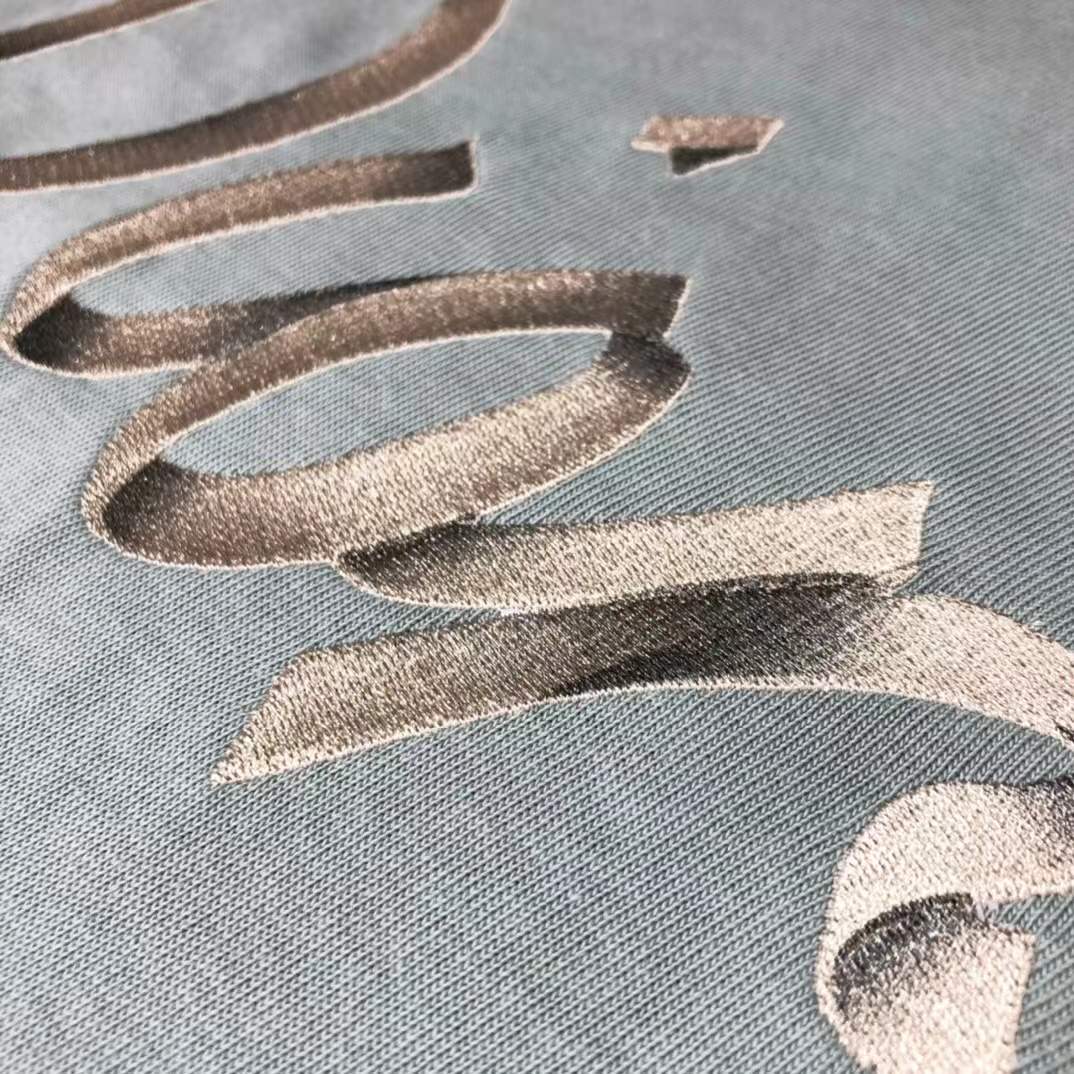 Dior Homme logo light green t-shirt from the Autumn/Winter 2022 collection.