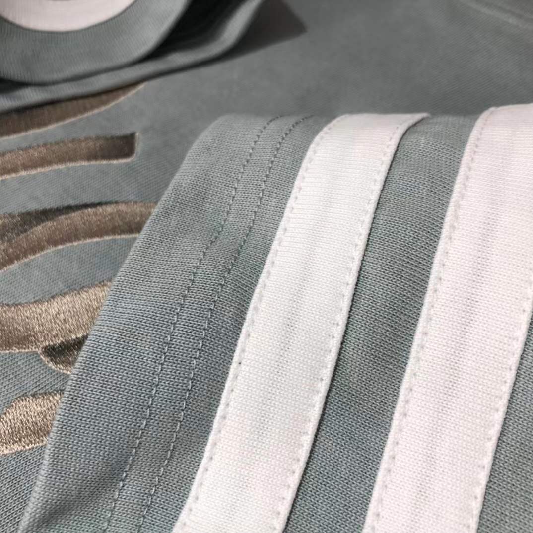 Dior Homme logo light green t-shirt from the Autumn/Winter 2022 collection.