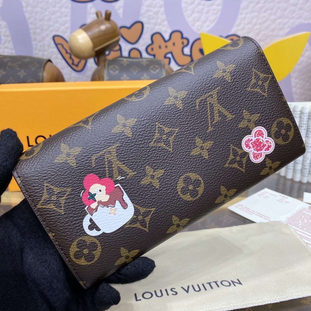 LV Sarah Wallet features the iconic Monogram canvas adorned with the Candy Factory Vivienne mascot and bright printed graphics