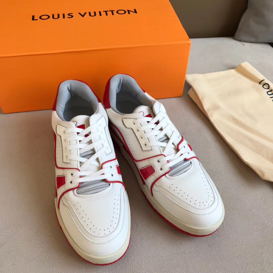 LV Trainer Sneaker in white and red is designed with grained calf leather and features sporty color accents inspired by vintage basketball shoes