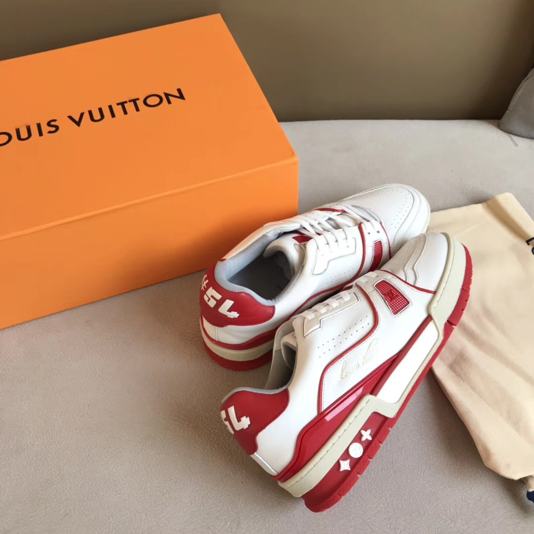 LV Trainer Sneaker in white and red is designed with grained calf leather and features sporty color accents inspired by vintage basketball shoes