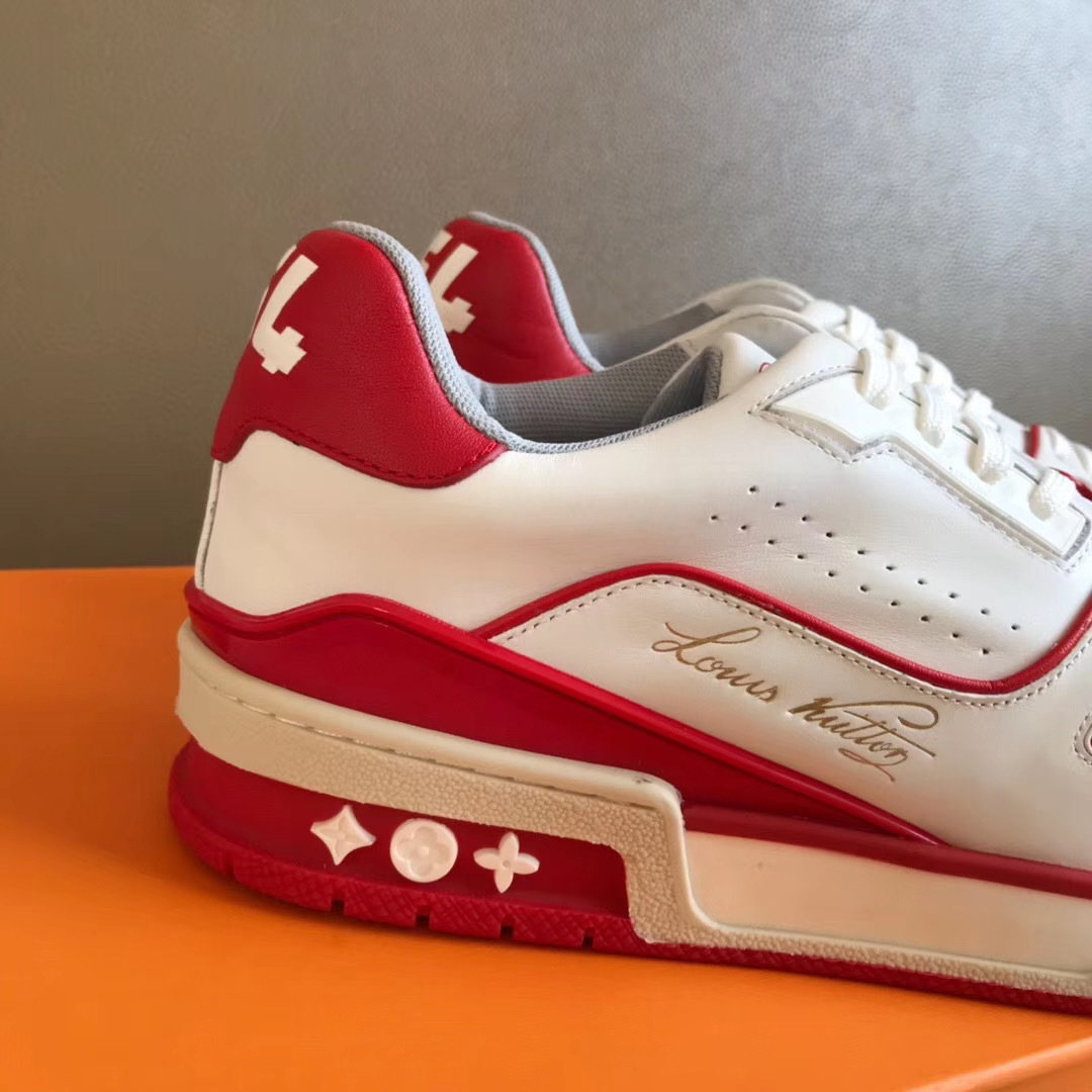 LV Trainer Sneaker in white and red is designed with grained calf leather and features sporty color accents inspired by vintage basketball shoes