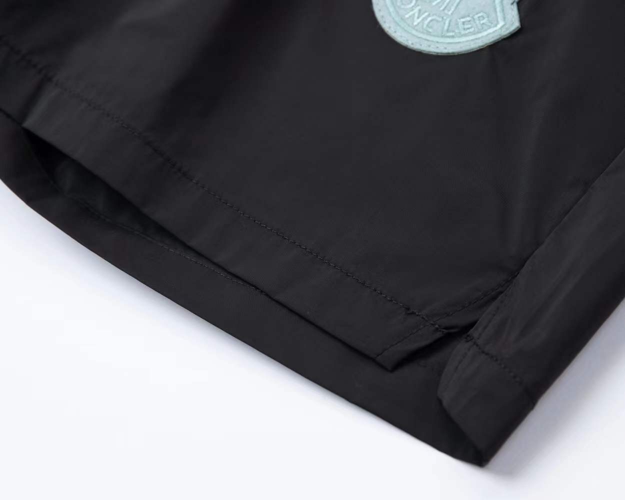 Moncler logo-patch shorts are designed for casual or swimwear