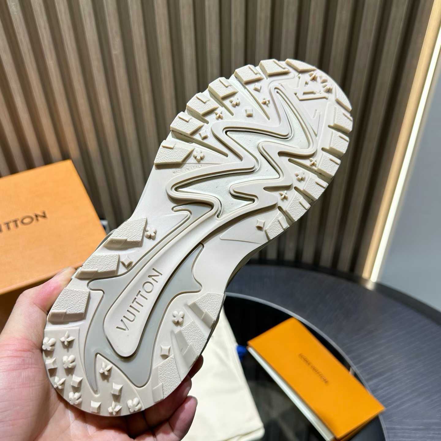 LV Runner Tatic Sneaker is an avant-garde interpretation of a running shoe featuring a mix of technical materials and details inspired by hiking shoes