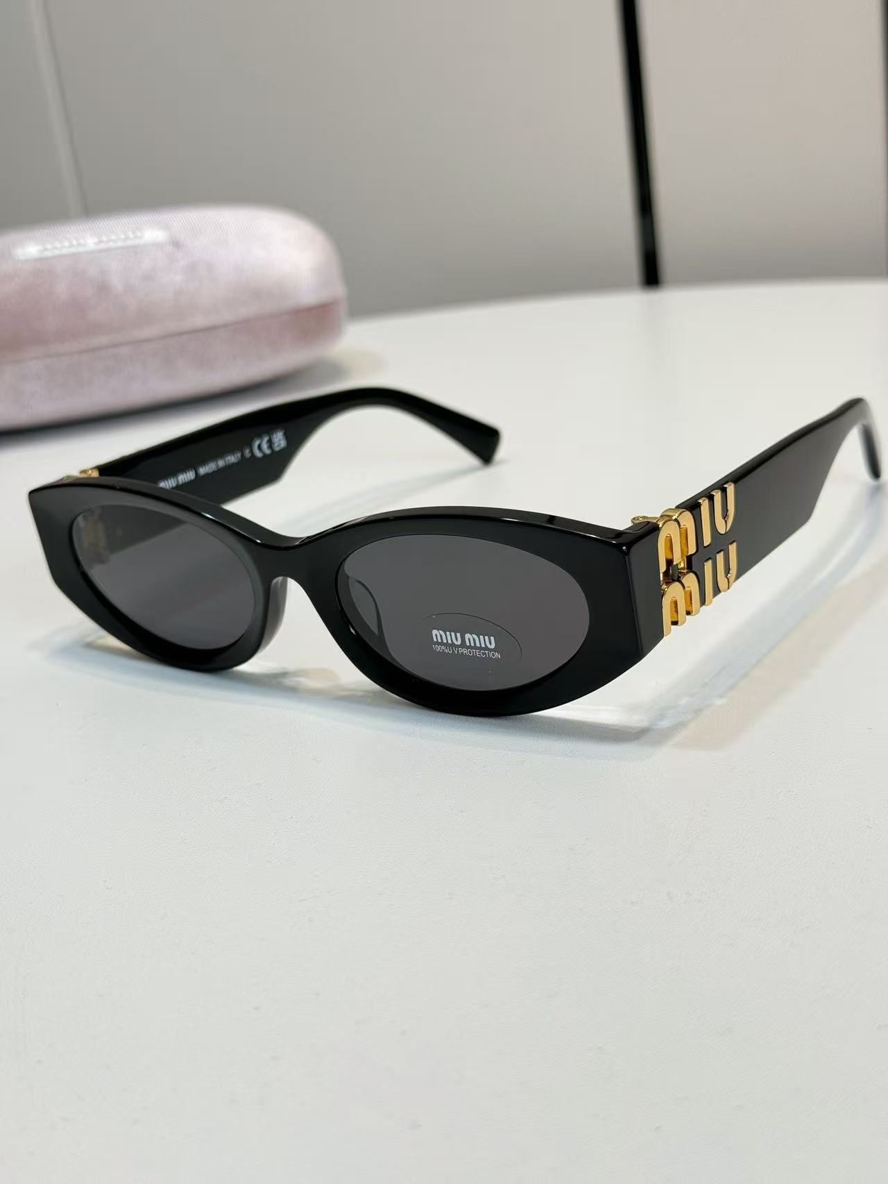 Miu Miu Eyewear Miu Glimpse oval-frame Sunglasses | Black