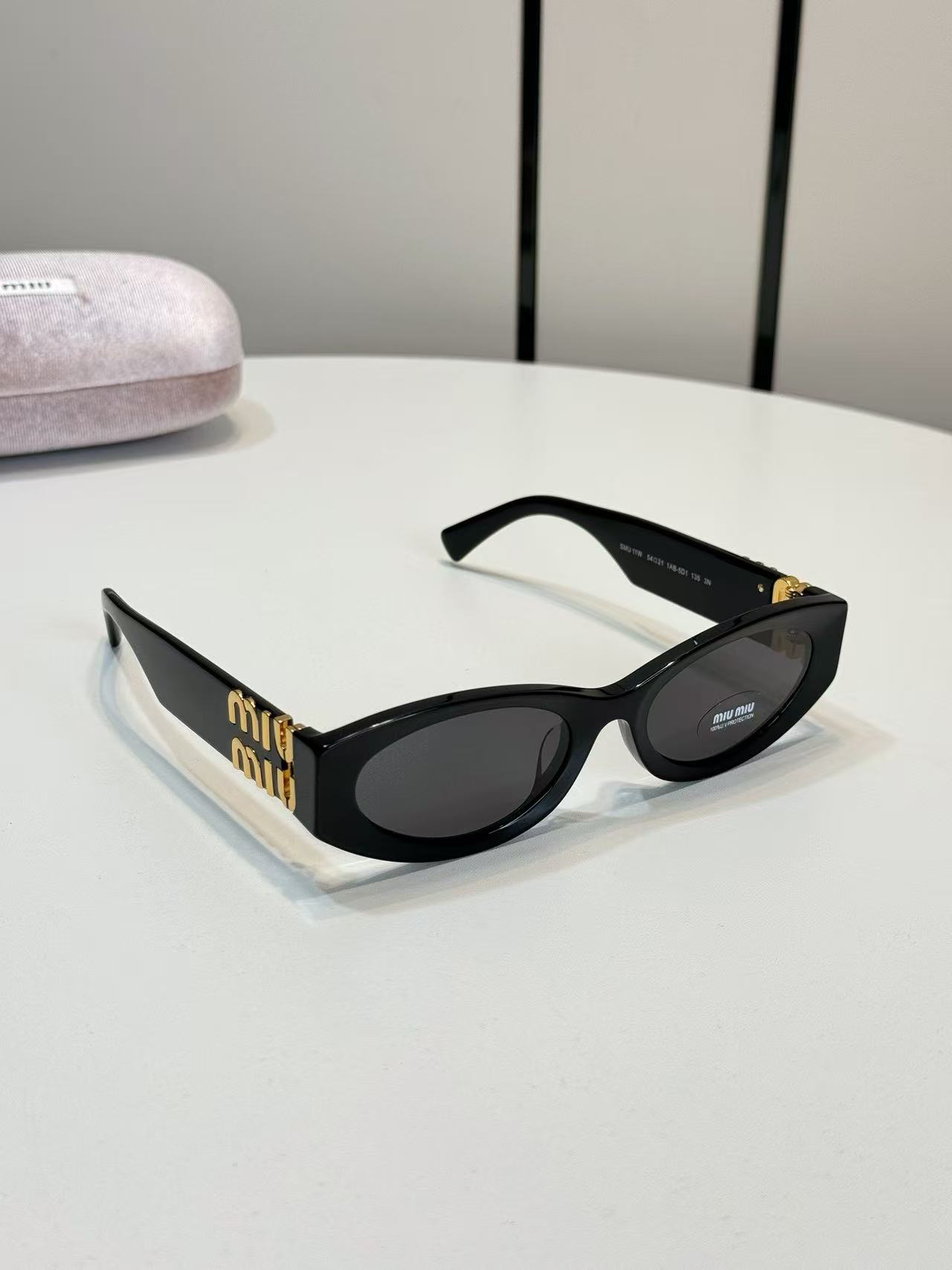 Miu Miu Eyewear Miu Glimpse oval-frame Sunglasses | Black