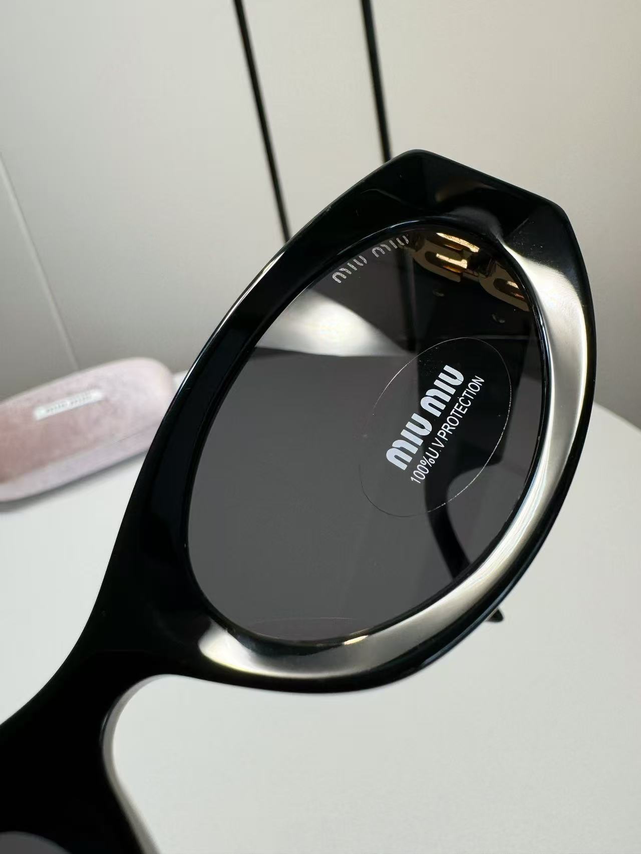 Miu Miu Eyewear Miu Glimpse oval-frame Sunglasses | Black