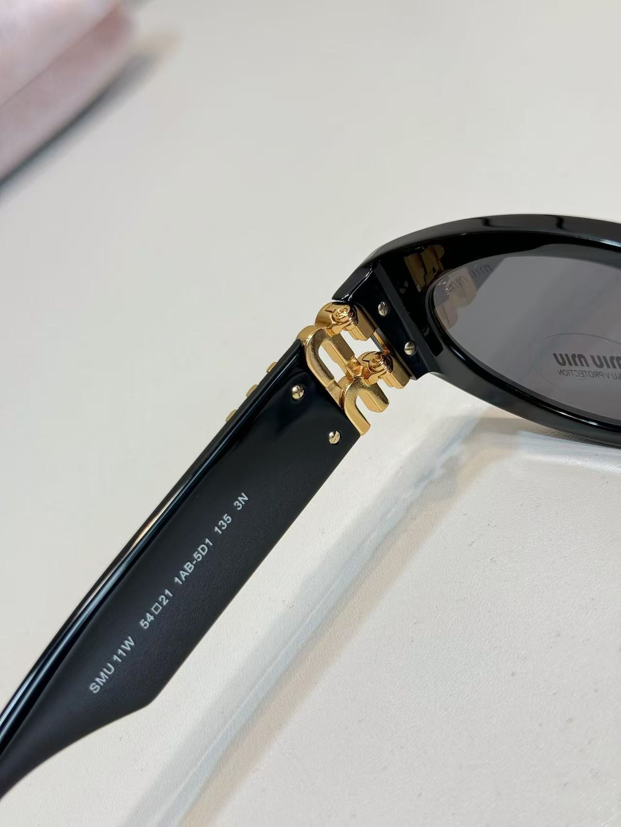 Miu Miu Eyewear Miu Glimpse oval-frame Sunglasses | Black