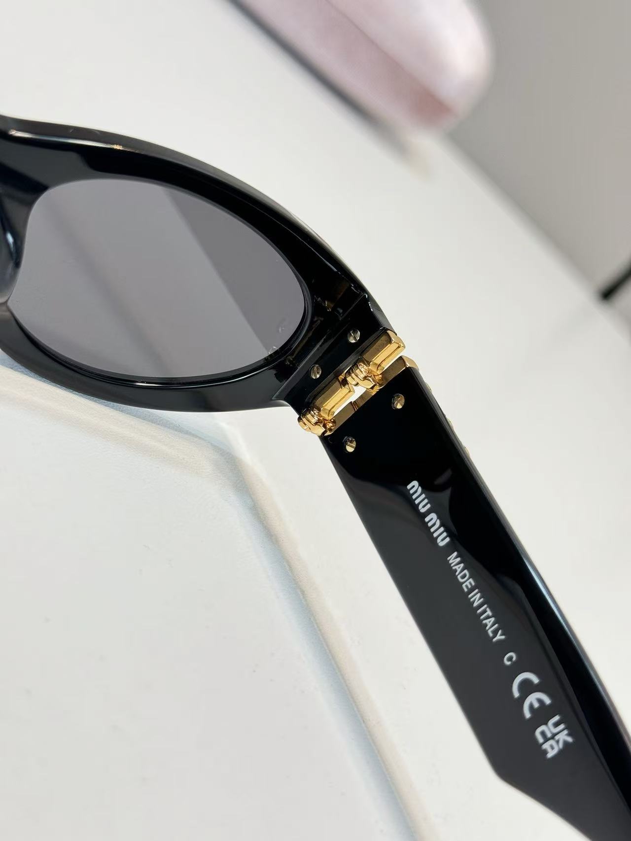 Miu Miu Eyewear Miu Glimpse oval-frame Sunglasses | Black