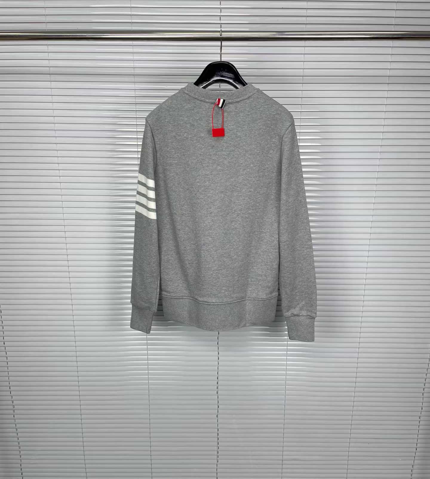 Thom Browne grey cotton sweatshirt featuring bird embroideries and the brand's signature four-bar stripes