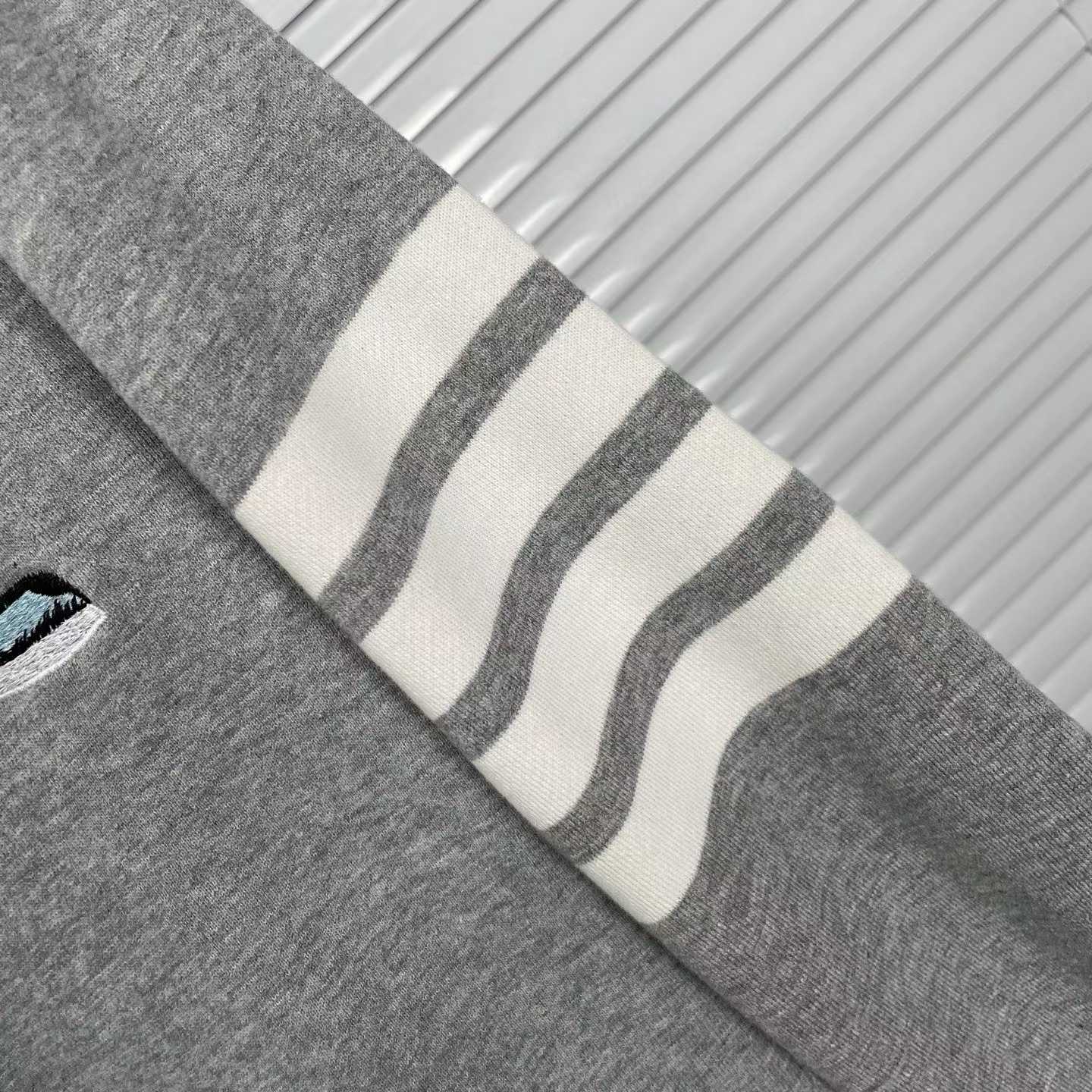 Thom Browne grey cotton sweatshirt featuring bird embroideries and the brand's signature four-bar stripes