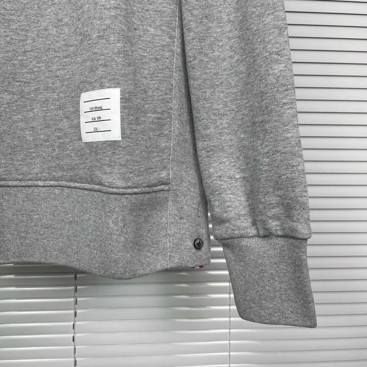 Thom Browne grey cotton sweatshirt featuring bird embroideries and the brand's signature four-bar stripes