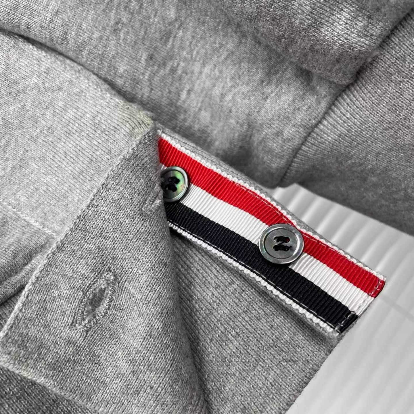 Thom Browne grey cotton sweatshirt featuring bird embroideries and the brand's signature four-bar stripes