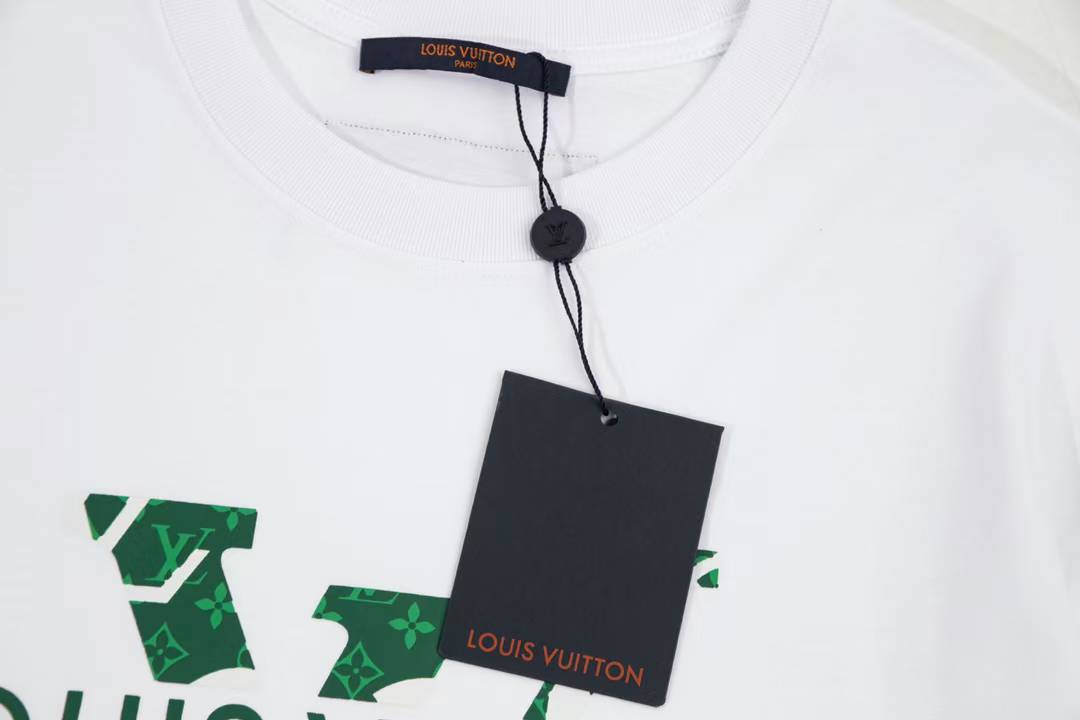LV Men's White T-shirt features a distinctive green logo print with floral accents and the text "MALLETERAPARIS" underneath