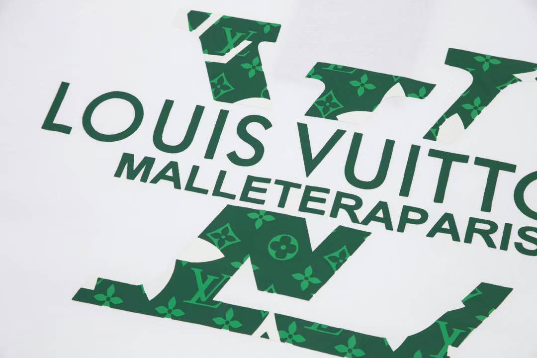 LV Men's White T-shirt features a distinctive green logo print with floral accents and the text "MALLETERAPARIS" underneath