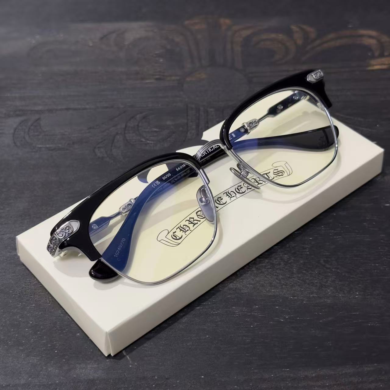 Chrome Hearts BONENNOISSEUR II spectacles featuring a black and brushed silver design.