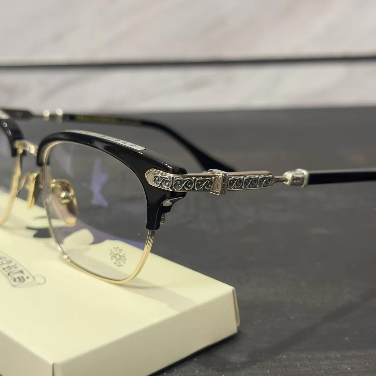 Chrome Hearts BONENNOISSEUR II spectacles featuring a black and brushed silver design.