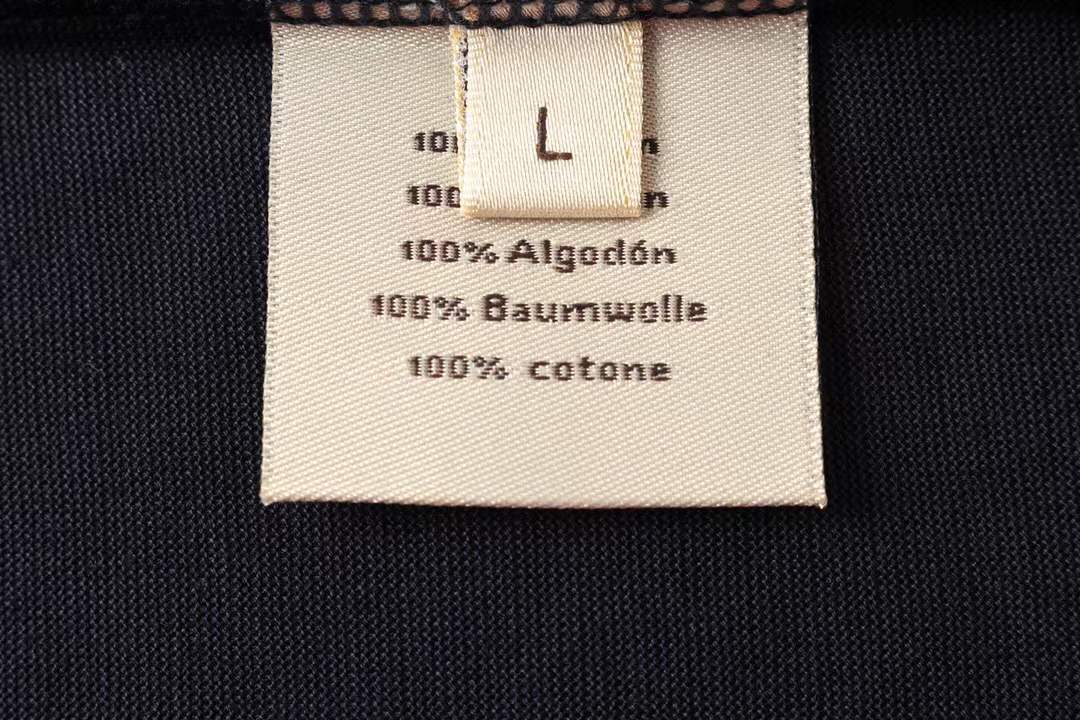 Hermès "Paris" cotton navy blue t-shirt featuring a detailed metallic-style horse graphic print.