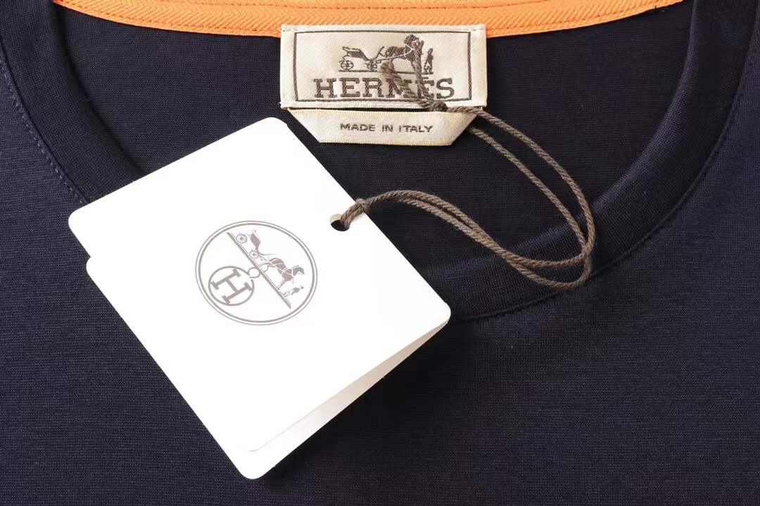 Hermès "Paris" cotton navy blue t-shirt featuring a detailed metallic-style horse graphic print.