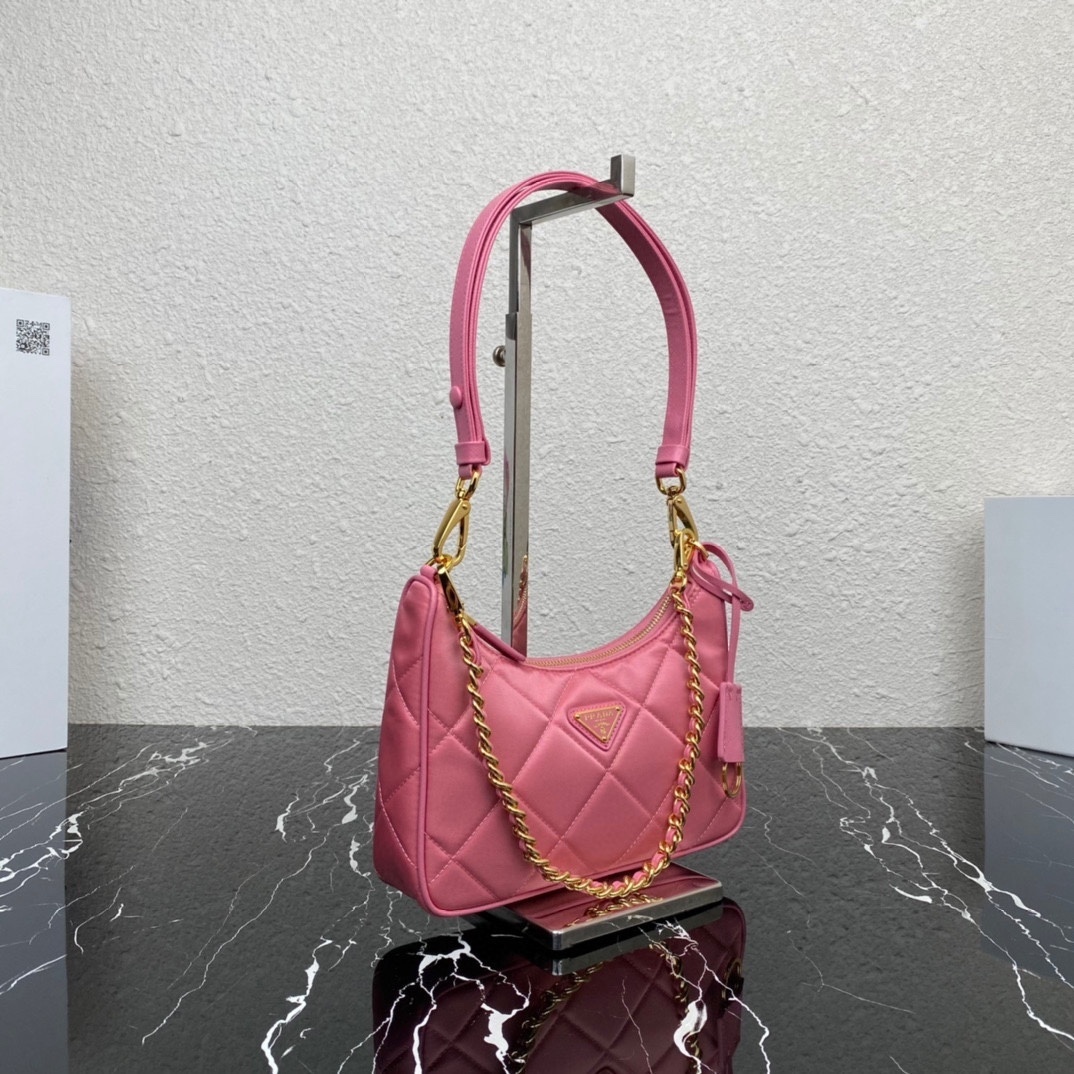 Prada Re-Edition 1995 Chaîne Re-Nylon mini bag in begonia pink