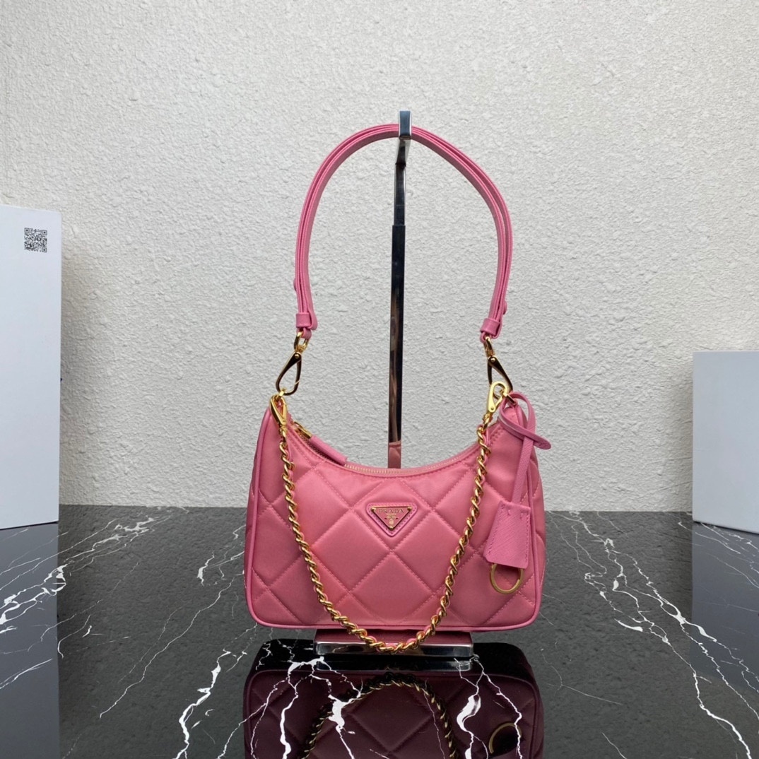 Prada Re-Edition 1995 Chaîne Re-Nylon mini bag in begonia pink