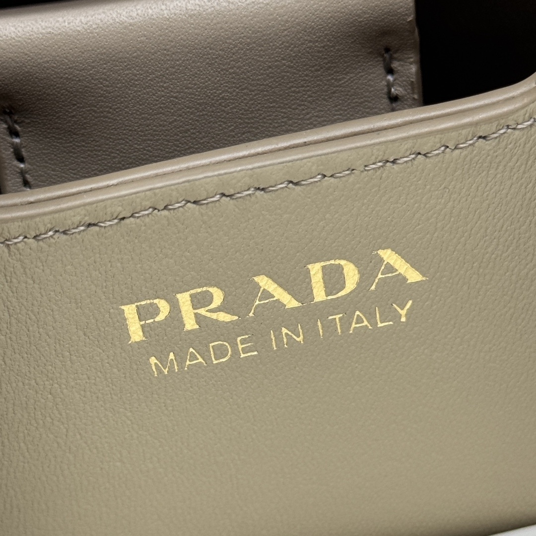 Prada Panier Small Saffiano Leather Bag in a beige or sand color