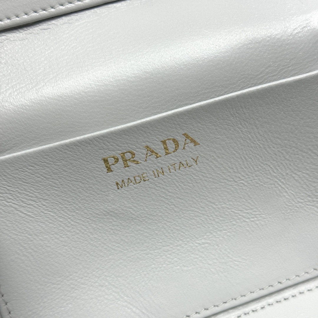 Prada Saffiano leather mini vanity bag in white