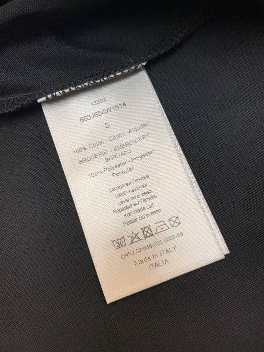 Dior x Cactus Jack Oversized T-shirt in black part of a collaboration featuring embroidered branding on the chest