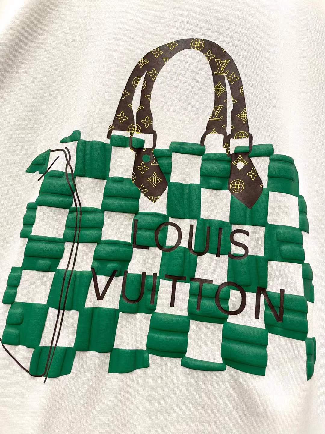 LV graphic t-shirt featuring a green and white Damier check patterned handbag design on the front