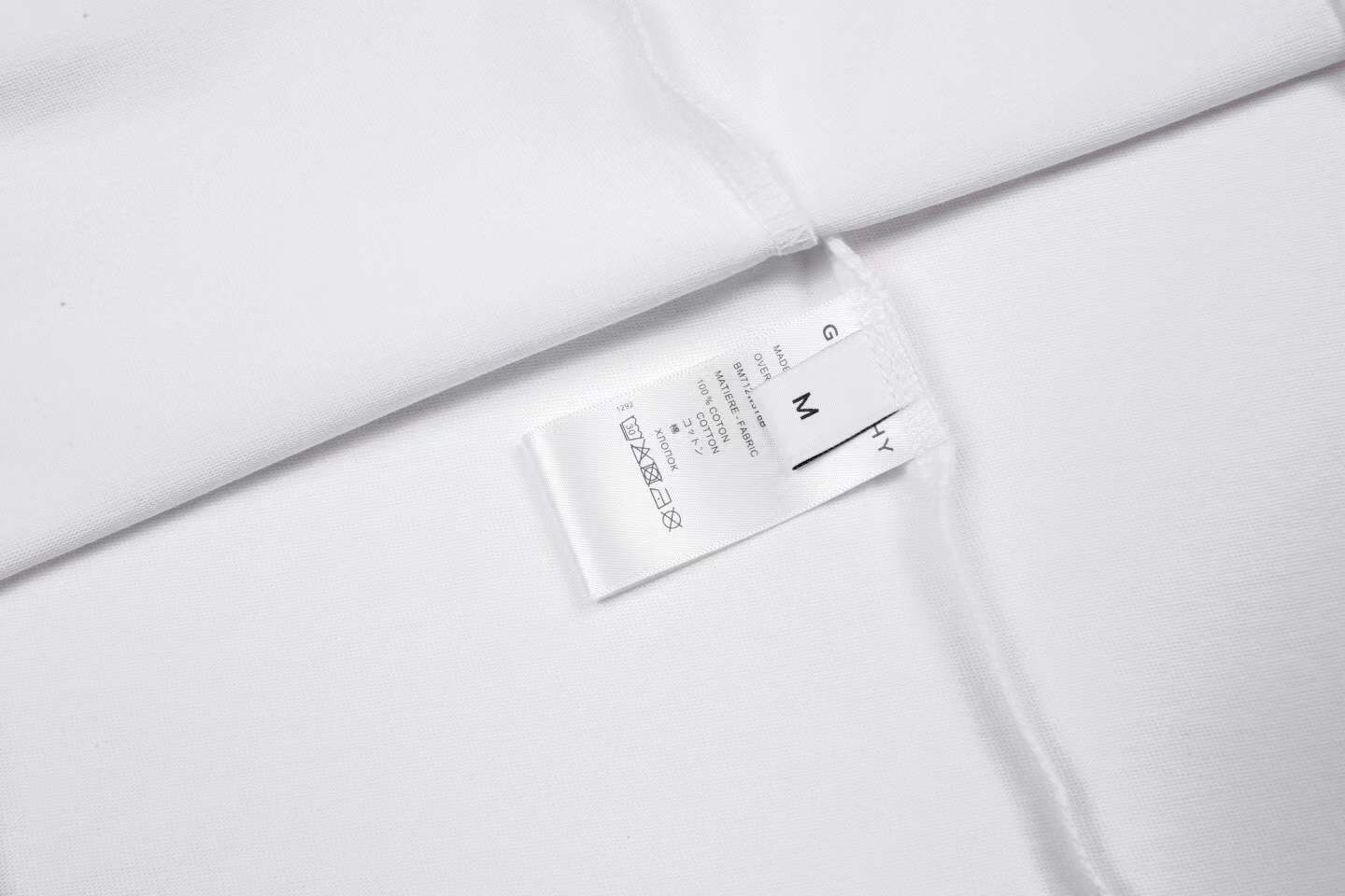givenchy white cotton t-shirt featuring a Givenchy 4G logo graphic on the front