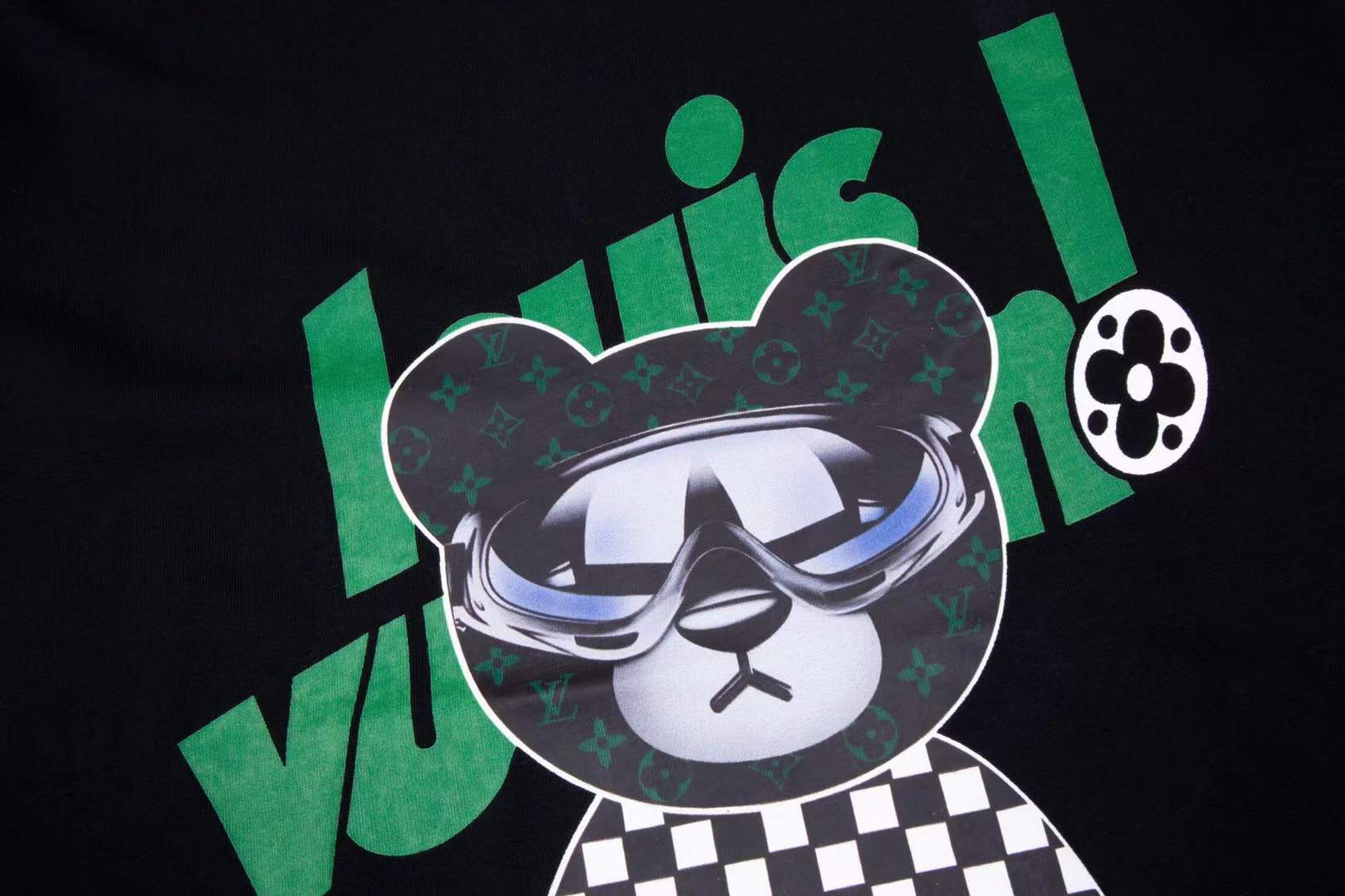 LV t-shirt features a graphic print of a teddy bear wearing futuristic sunglasses and a checkerboard pattern top