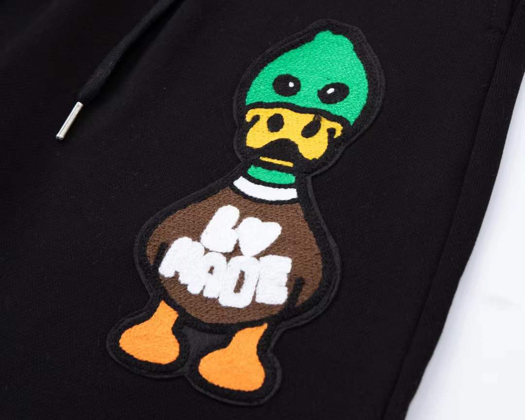 LV Paris Duck shorts feature a cartoon graphic on the leg