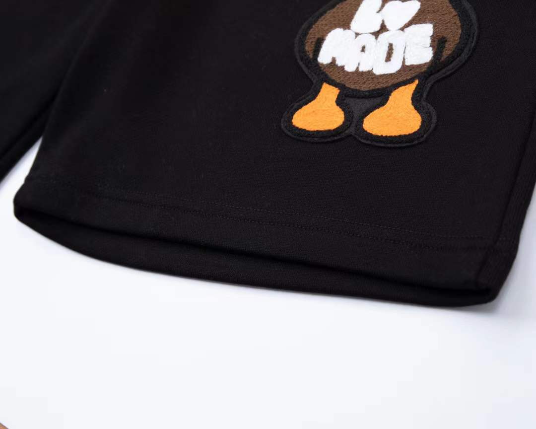 LV Paris Duck shorts feature a cartoon graphic on the leg
