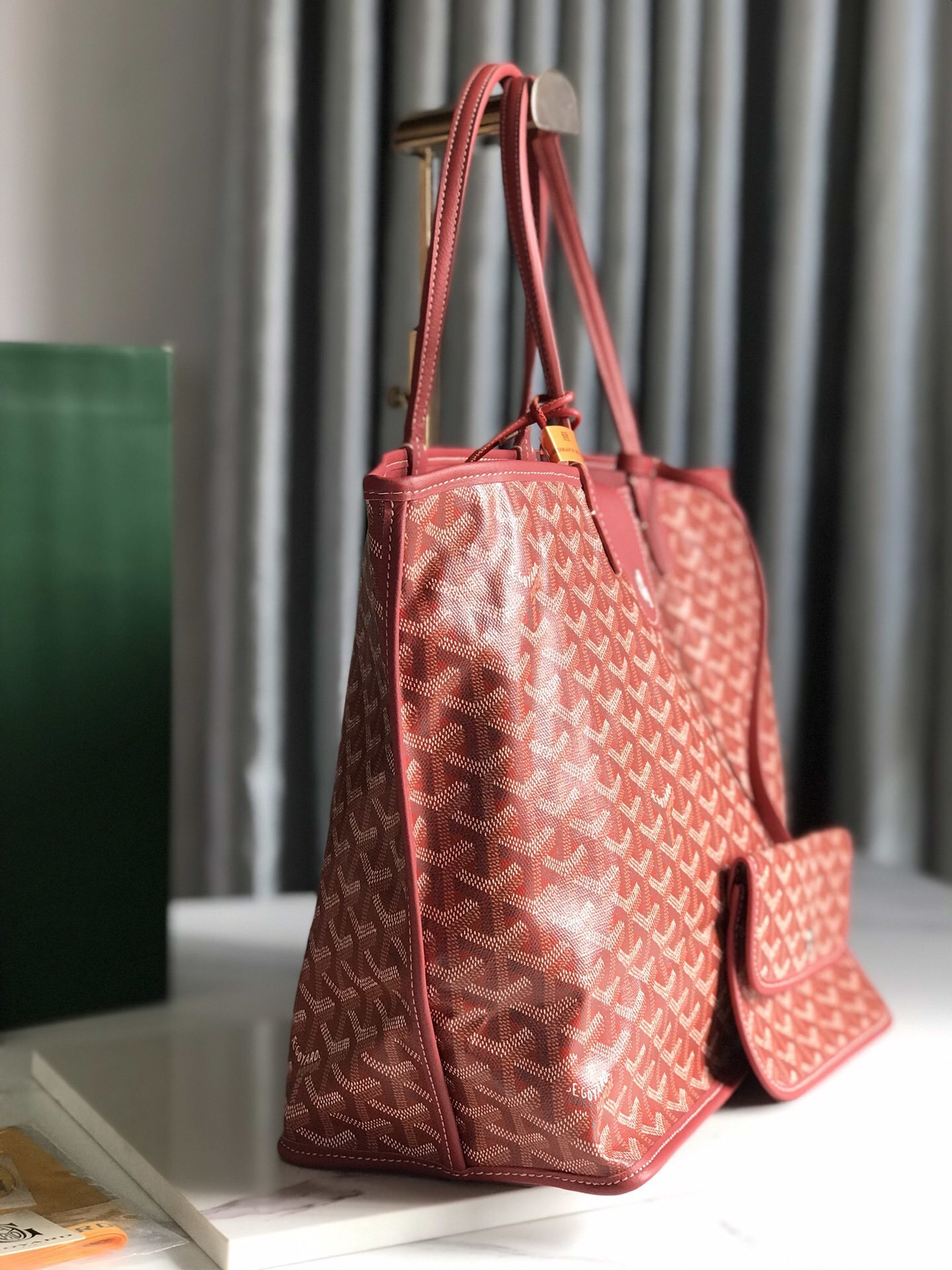 Goyard Saint Louis PM tote in red, featuring the iconic chevron-patterned Goyardine canvas