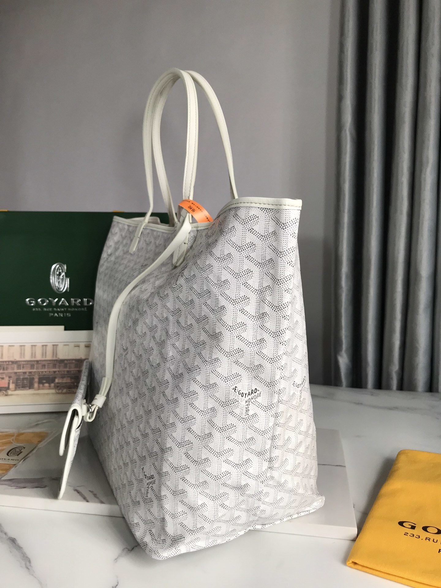 Goyard Saint Louis PM tote bag featuring the brand's signature Goyardine canvas and a matching removable pouch