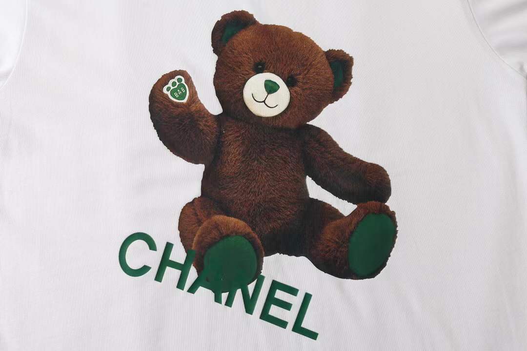 Chanel themed t-shirt featuring a bear graphic, similar to designs found on various retail platforms