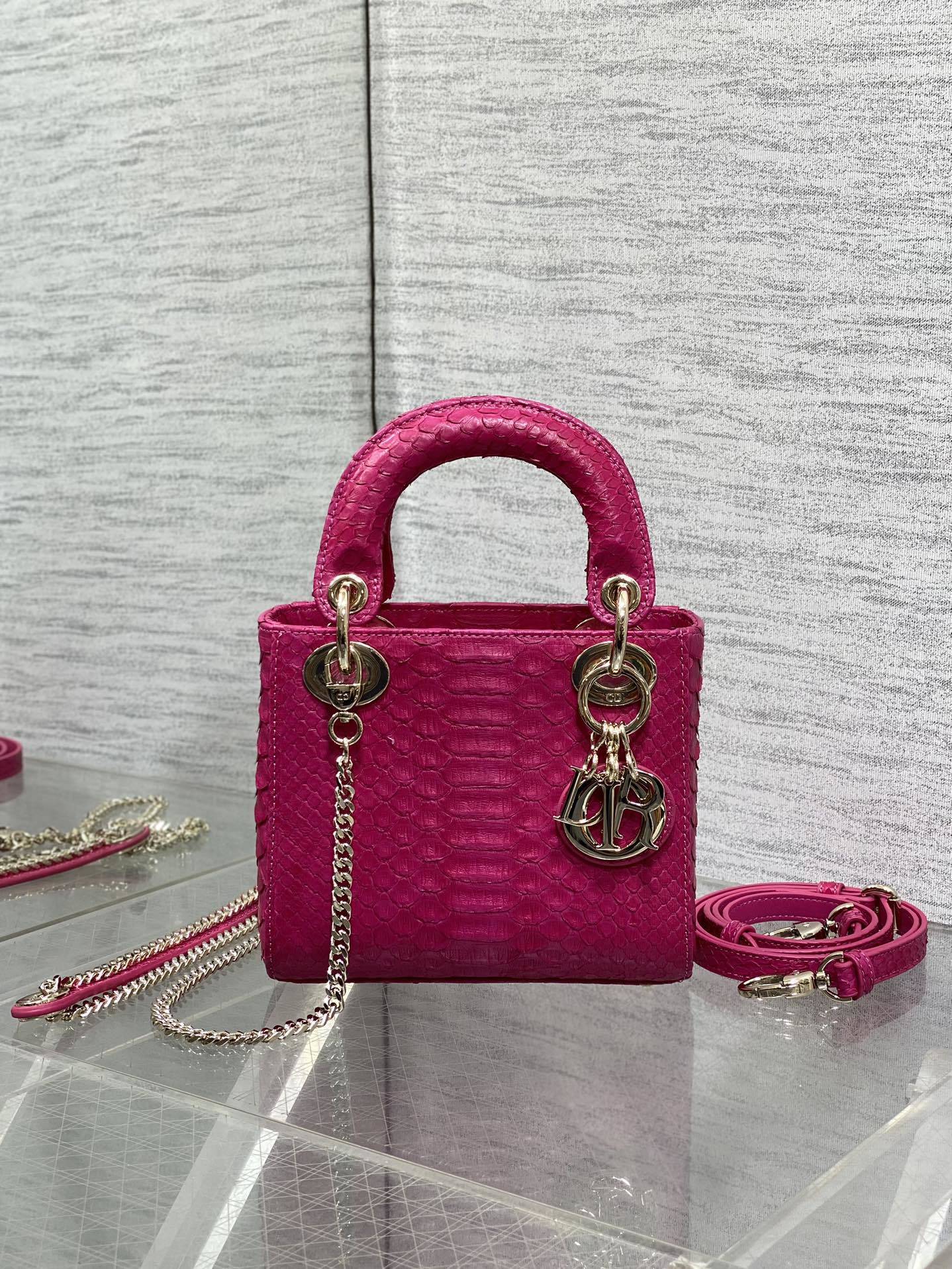 Christian Dior Mini Lady Dior handbag made of fuchsia pink python leather