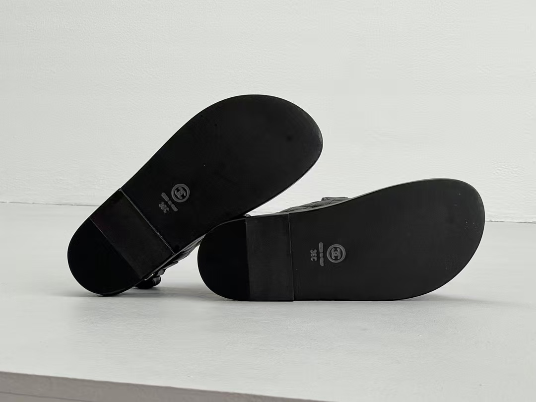 Chanel sandals feature a diamond-quilted finish and the signature interlocking CC logo on the touch-strap fastenings